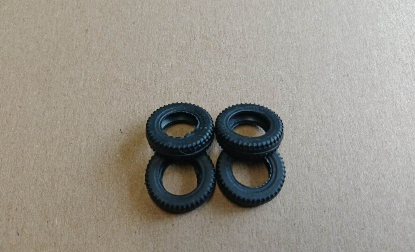 Dinky 15mm treaded tyre black X 4  with slot for ridged wheels 153  188 DD50